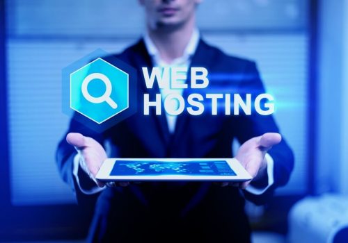 website-hosting-concept-with-man-holding-tablet (1)